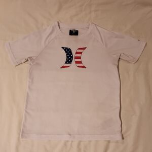 Hurley White Tee with American Flag Graphic. Size Medium